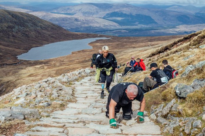 Double amputee crawls to the summit of Ben Nevis in only 12 hours
